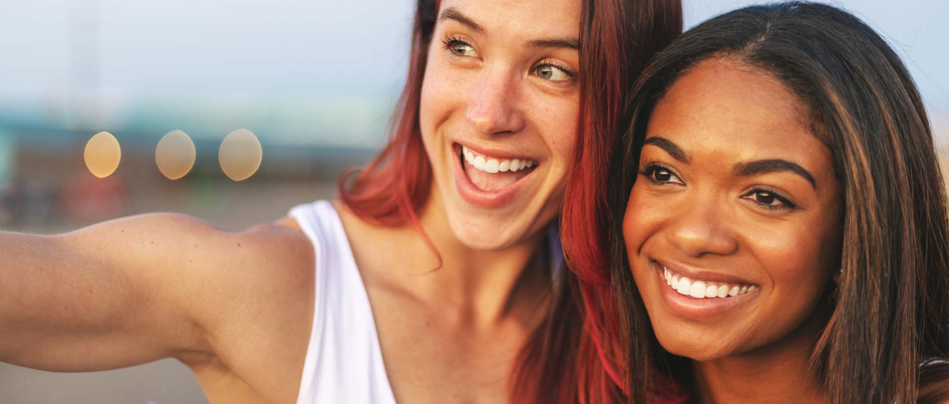 Two women together smiling